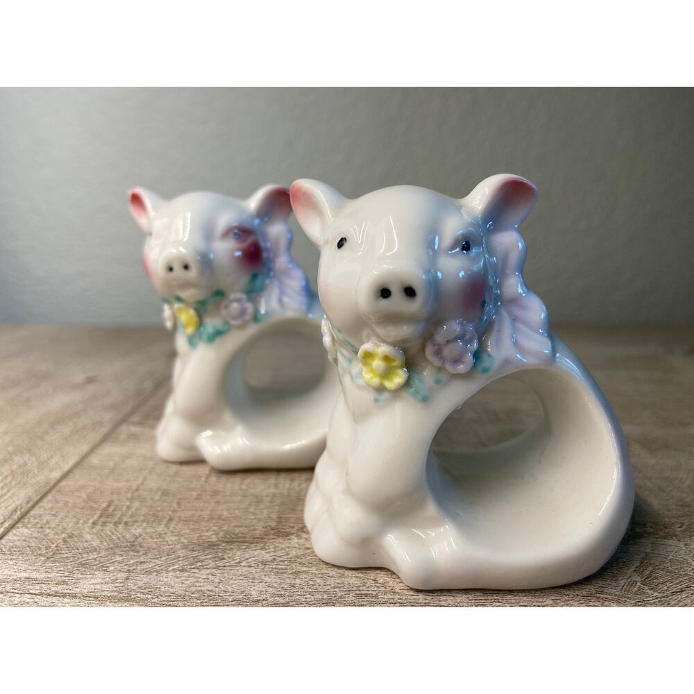 A Pair of Vintage Ceramic Pigs Flowers with Lavender Bow Napkin Rings